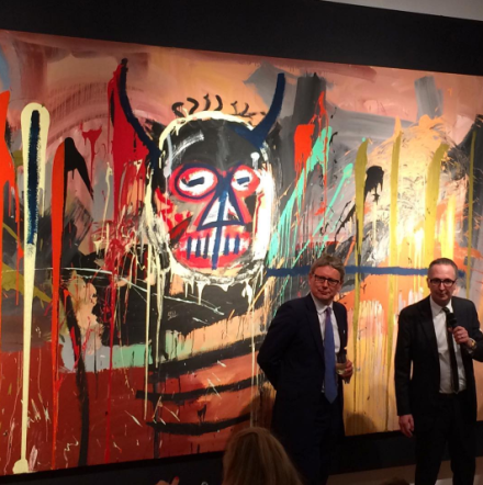 Jussi Pylkkanen and Bretty Gorvy in front of the Record-setting Basquait, via Art Observed
