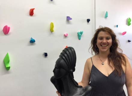 Artist Sophia Angelakis with a series of her small scale sculptures, via Art Observed