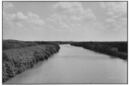 Zoe Leonard, from the Puente Colombia, looking downstream (2017-2022), via Hauser & Wirth